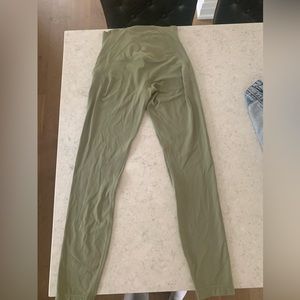 Brand new Green aligns worn once to try on.size 4